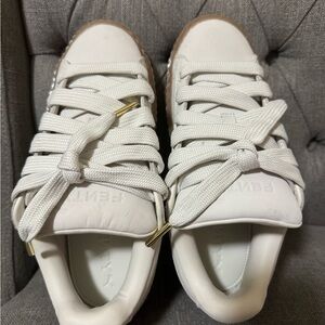 Puma Women's Off White Sneakers with Gold Accents